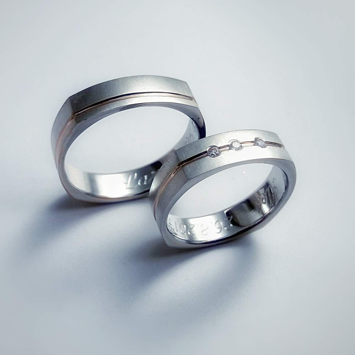 Wedding rings with groove and diamonds